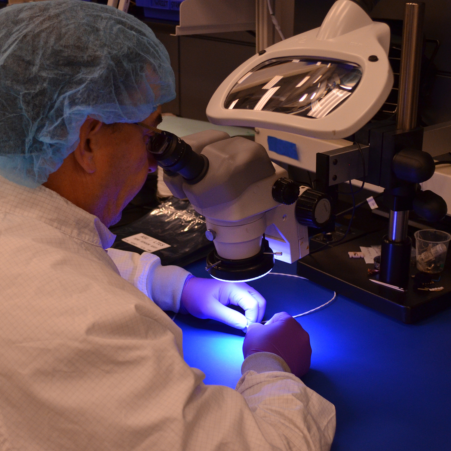 Rob Woodward (ASU) checking the LTES Thermistors before putting them in the oven for curing.